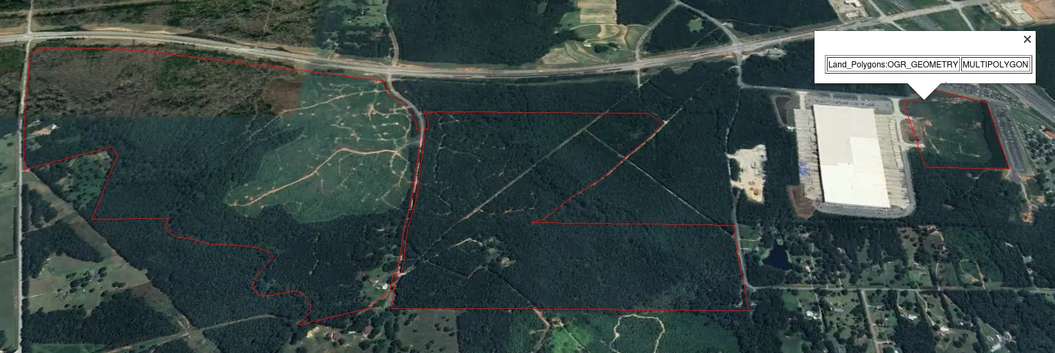 Google Earth, with two irregularly shaped red outlines. One has a popup dialog with a table reading “Land_Polygons:OGR_GEOMETRY”, and a value of “MULTIPOLYGON”